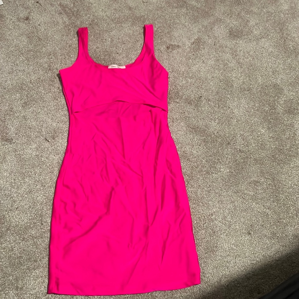 a hot pink dress worn once very cute comfortable material has a cut out design